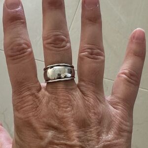 Wide sterling silver ring.